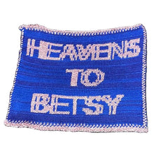 Load image into Gallery viewer, Blue Knit fiber art with 'Heaven's to Betsy' text on a white background