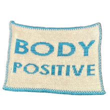 Load image into Gallery viewer, Knitted fiber art with 'BODY POSITIVE' text in blue on a white background
