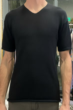 Load image into Gallery viewer, A green men's V-neck T-shirt with a striped pattern on a mannequin.
