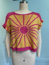 Load image into Gallery viewer, Yellow and pink knitted top on a mannequin arm against a light blue background
