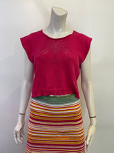 Load image into Gallery viewer, Mannequin wearing a red sweater with a colorful striped skirt on a white background
