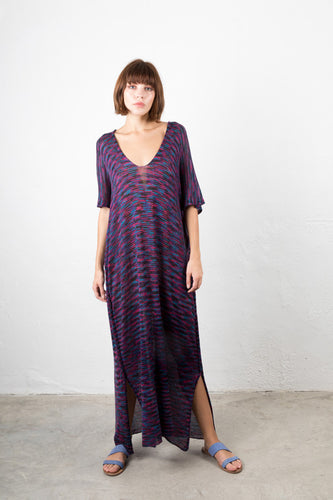 Woman in Multicolored Caftan